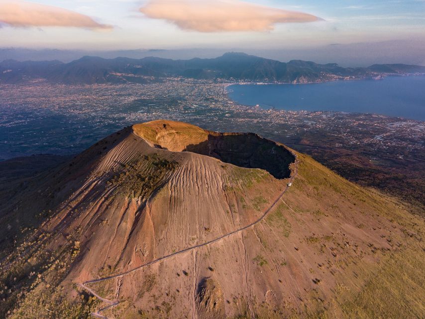 From Sorrento: Pompeii and Vesuvius Tour by Express Train - Pompeii at Speed: Skip-the-Line Entry Plus a 2-Hour Group Guide
