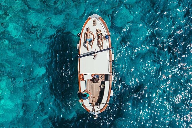 Full day on a private boat to discover Capri - Marina Grande to Marina Piccola: Sailors Cave and a calmer bay feel