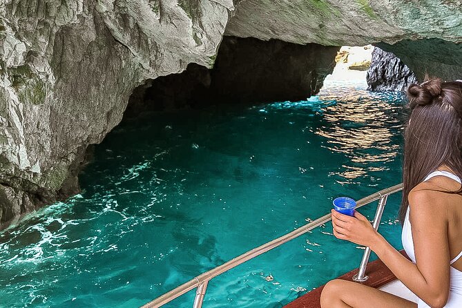 Full day on a private boat to discover Capri - Grotta Verde, White Grotta, and Natural Arch: the cave circuit on your schedule