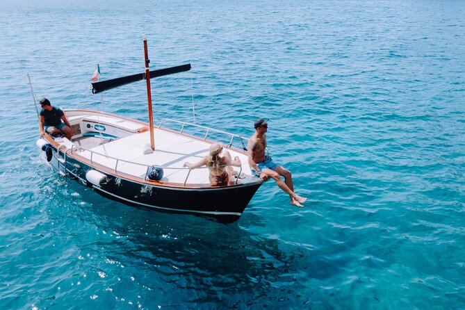 Full day on a private boat to discover Capri - I Faraglioni: the three rocks plus a classic photo moment