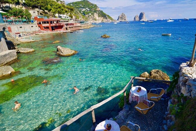 Full Day Private Boat Tour to Capri from Positano - Capri from the water: Marina Grande and the Bagni di Tiberio area