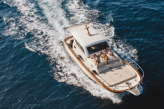 Full-Day Private Guided Boat Tour in Capri - I Faraglioni: your long stop for water time and coastline views