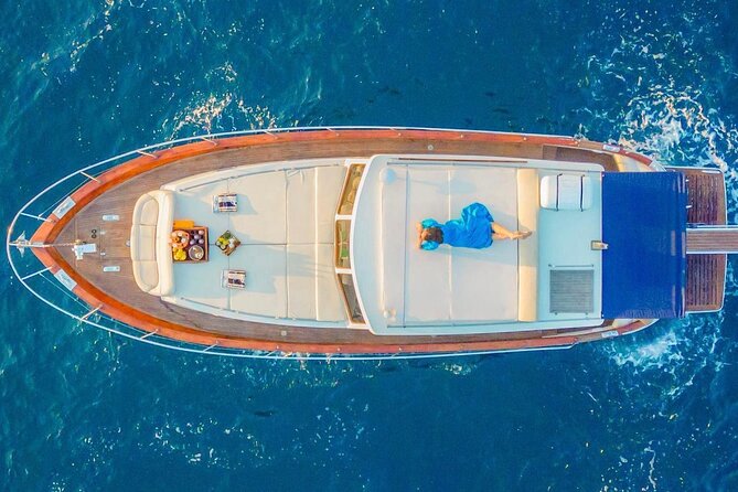 Guided day by boat to the Secrets of the Island of Capri - Faraglioni and the Wish: The Capri Icon from the Sea