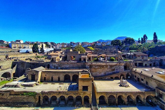 Guided Tour of Pompeii and Herculaneum with Lunch and Ticket - Lupanar and Teatro Grande: the darker and theatrical sides of Pompeii