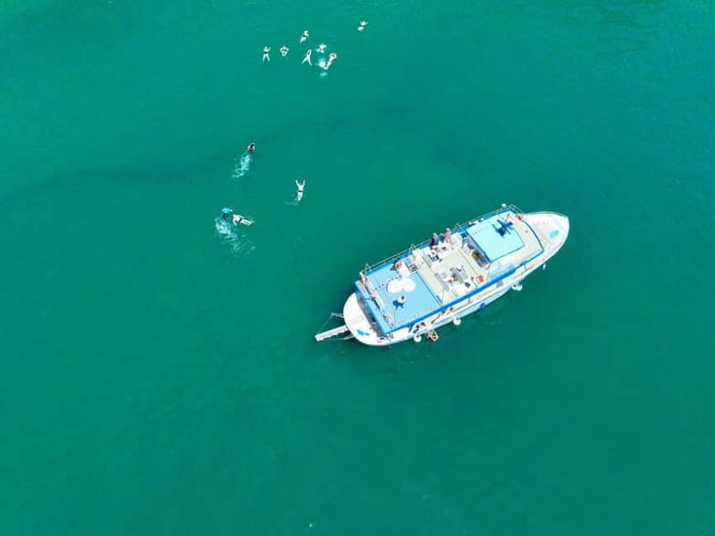 Ischia: Boat tour with swimming stops and lunch on board - Stop-by-stop along Ischia’s coast, from Chiesa del Soccorso to Sant’Angelo