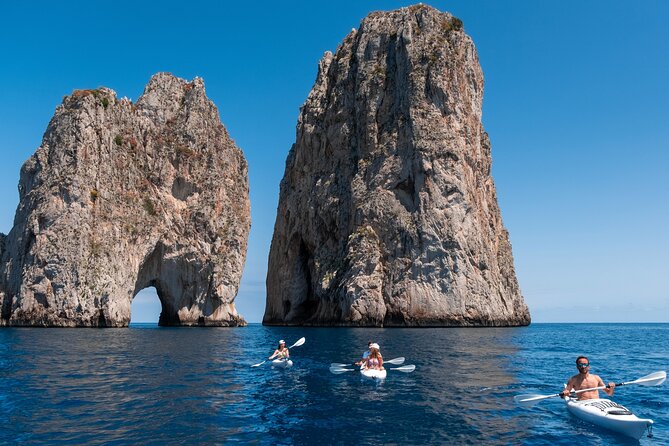 Kayak tour in Capri between caves and beaches. Photos included. - Arco della Stella and the Faraglioni GoPro Photo Moment