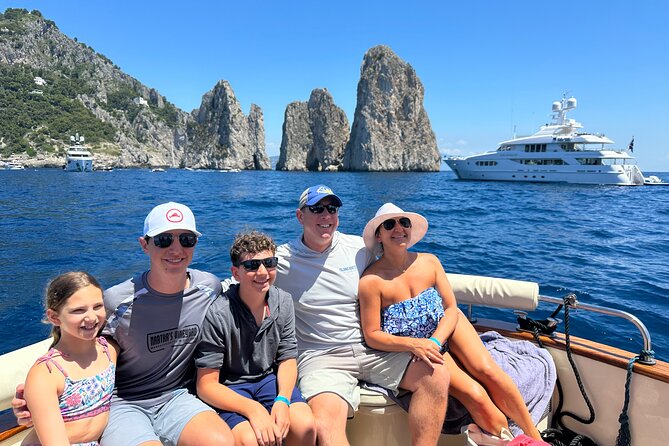 Luxury private boat tour to Capri and Blue Grotto on Gozzo 32 ft - Marina Piccola and I Faraglioni: Icon Views with Short, Efficient Stops