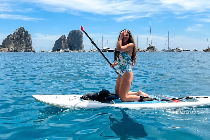 Paddleboard in Capri between caves and beaches. Photos included! - Swimming is mandatory, and your comfort level is the ticket