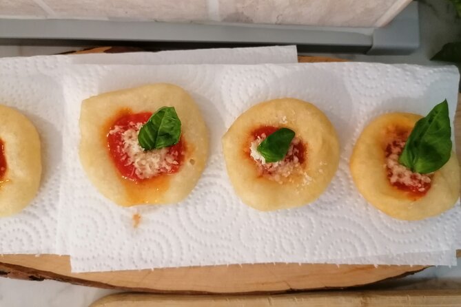 Pizza e Tiramisù class with local mum in Positano - Pizza dough, rolled and stretched: learning the technique behind real flavor