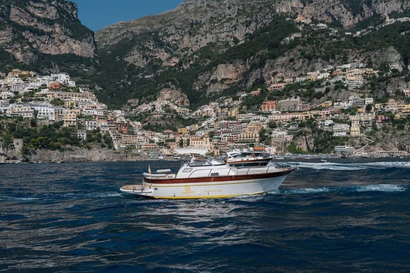 Positano: Amalfi Coast & Emerald Grotto Private Boat Tour - Scoglio dell’Isca snorkeling: clear water, included gear, real fun