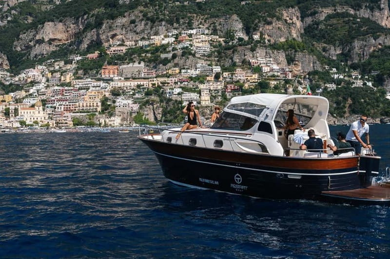 Positano: Amalfi Coast & Emerald Grotto Private Boat Tour - Emerald Grotto: intense green water and the best way to plan the add-on