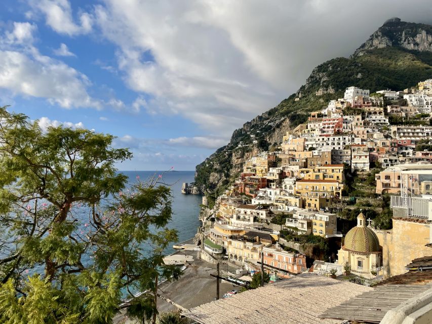 Positano: Old Town Walking Tour with Archaeologist Guide - Downtown Positano shopping streets, ceramics, sandals, and local art