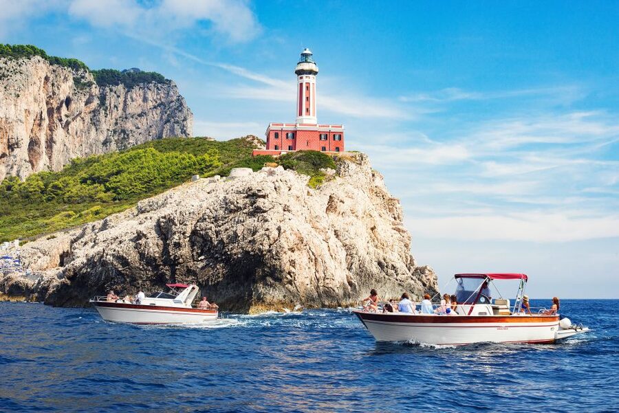 Positano: Small-Group Boat Excursion to Capri Island - Riding Along the Sorrento Coast: Waterfalls, Watchtowers, and Quick Photos