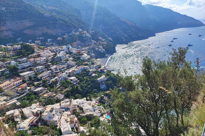 Positano, Sorrento and Pompeii Guided Tour from Naples - Positano in One Hour: Stair Lanes, Fashion Shops, and Beach Access