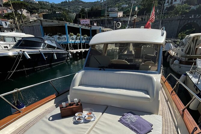 Private Amalfi Coast Boat Tour from Positano: Swim & Explore - Private Amalfi Coast boat day from Positano, with a swim-focused route