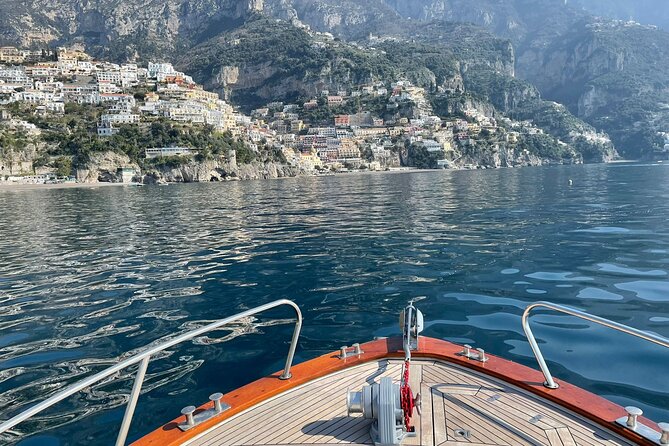 Private Amalfi Coast Boat Tour from Positano: Swim & Explore - Conca dei Marini, the Elefanti arch, and the optional Emerald Grotto