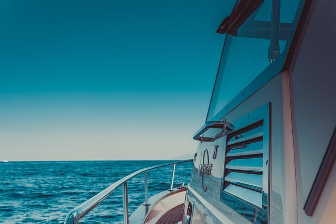 Private Boat Tour from Sorrento to Capri on a Classic Gozzo 7.50 - Faraglioni Views: Iconic Rocks and a Bit of Romance