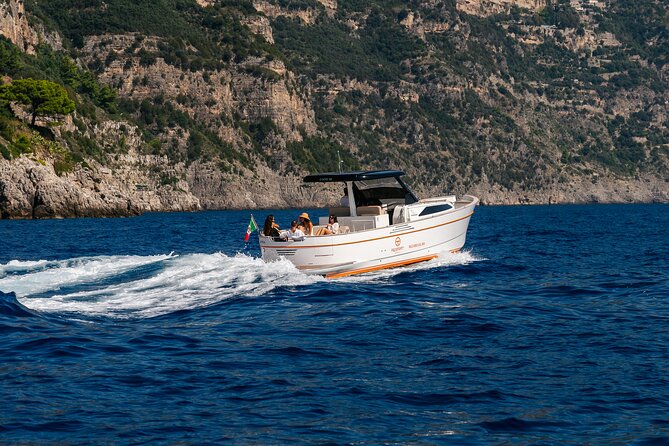 Private Boat Tour To Capri Departing From Positano - Sea-level highlights on the way out of Positano