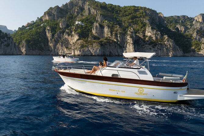 Private Ischia Boat Tour from Positano: Full Day Trip - Leaving Positano: beaches, fjords, and sea views that feel custom