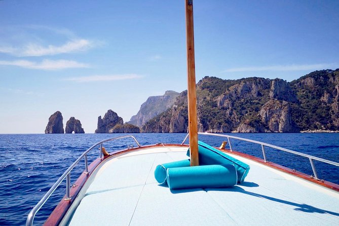 Private Island of Capri Boat Tour for Couples - The east coast pass-by sights: the rock arch and the legends viewpoint