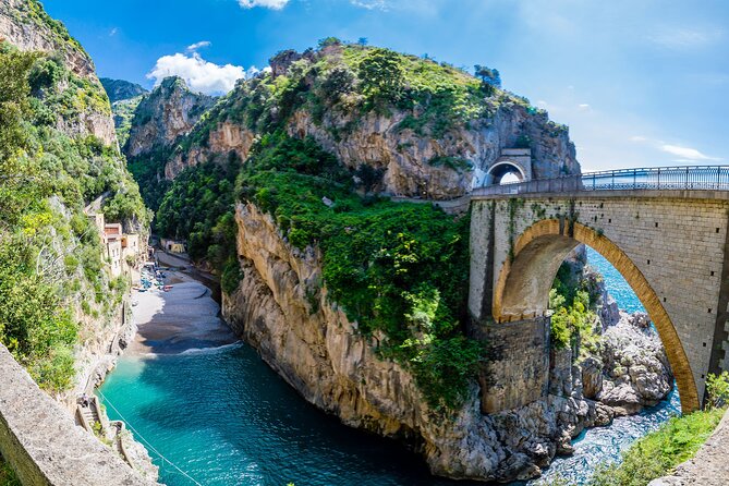 Private Tour of the Amalfi Coast from Sorrento with Driver - Positano at walking pace: alleys, Spiaggia Grande, and the Santa Maria Assunta dome