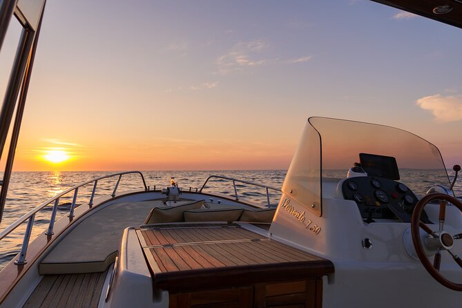 Private tour of the island of Ischia on a Fratelli Aprea gozzo - Aperitif time on Spiaggia dei Maronti with prosecco