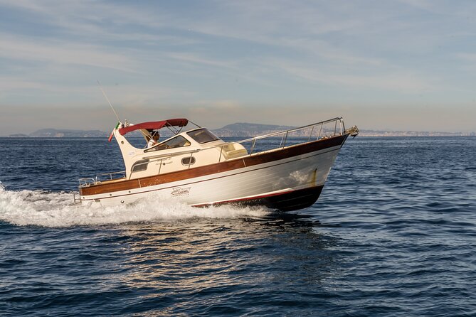 Private Tour to Capri & Positano from Sorrento Classic Gozzo 850 - White Grotto, Faraglioni, and the Capri Rock Formations You Came For