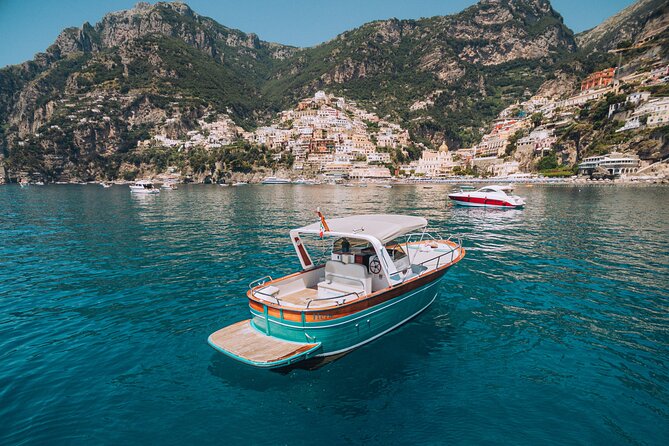 Shared boat tour to the Amalfi Coast from Sorrento - Amalfi stop: town time, swim breaks, and light onboard snacking