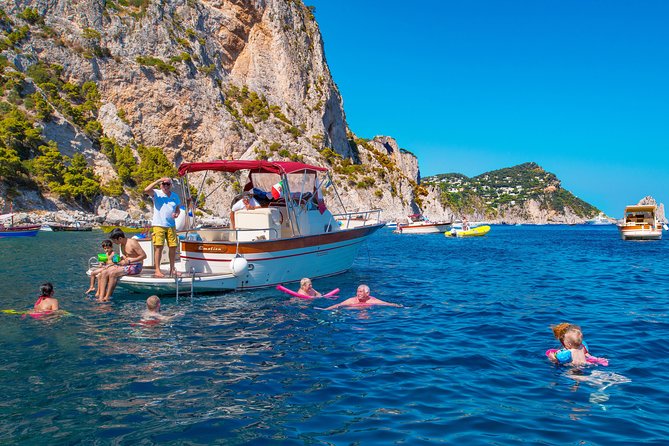 Small Group Boat Day Excursion to Capri Island from Sorrento - The boat route: White Grotta, Green Grotta, Faraglioni, and the iconic passes
