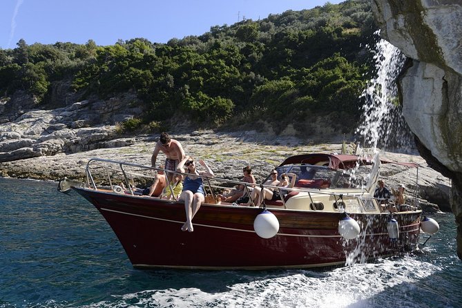 Small Group Boat Tour Capri & Blue Grotto with Swimming Stops - Sorrento Coast Cruising: Marina Grande and the Roman Villa Views