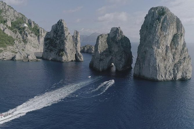 Small Group Day Trip to Capri from Positano or Praiano - Cruising the Capri perimeter: White Grotta, Natural Arch, and Faraglioni views