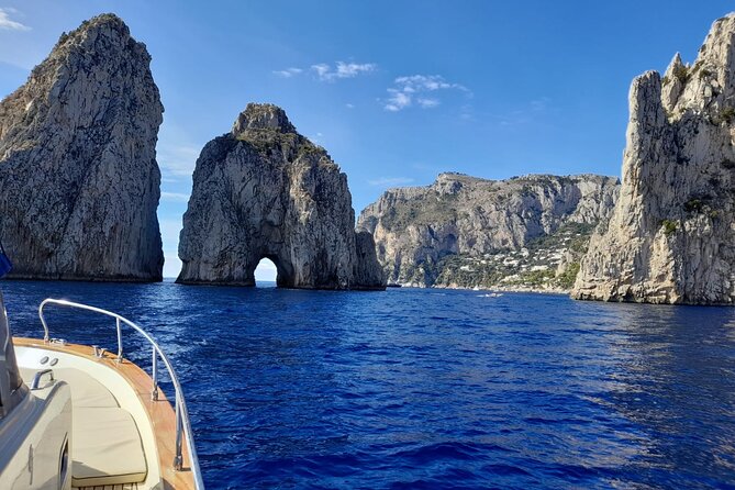 Small Group Tour from Salerno to Capri by Boat - I Faraglioni Swim Stop: Swimming by the Famous Rock Formations