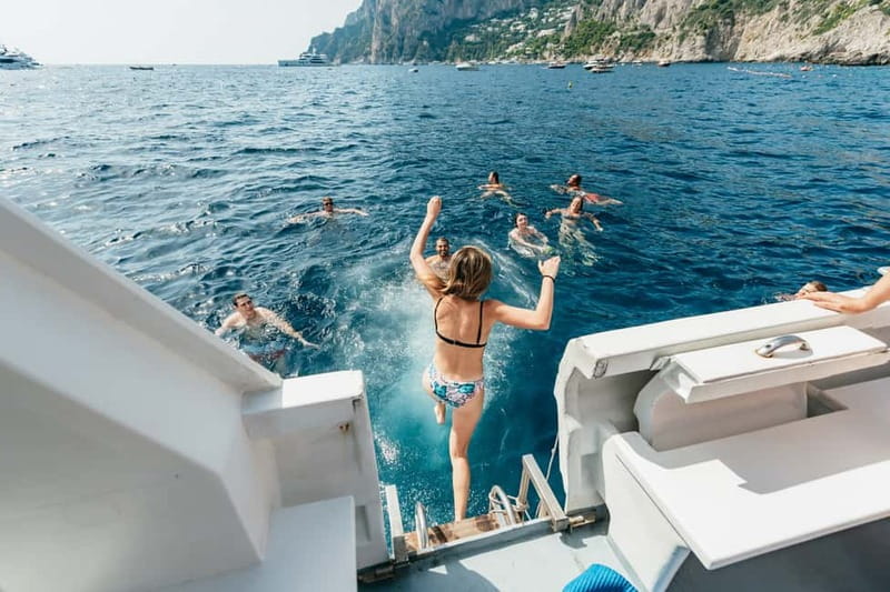 Sorrento: Coast and Capri Boat Trip with Limoncello Tasting - The boat loop around Capri: grottos, arches, and the iconic rock formations