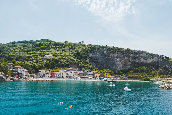 Sorrento Coast Cruise with Limoncello Tasting - The swim stop: snorkeling masks, turquoise water, and limoncello timing
