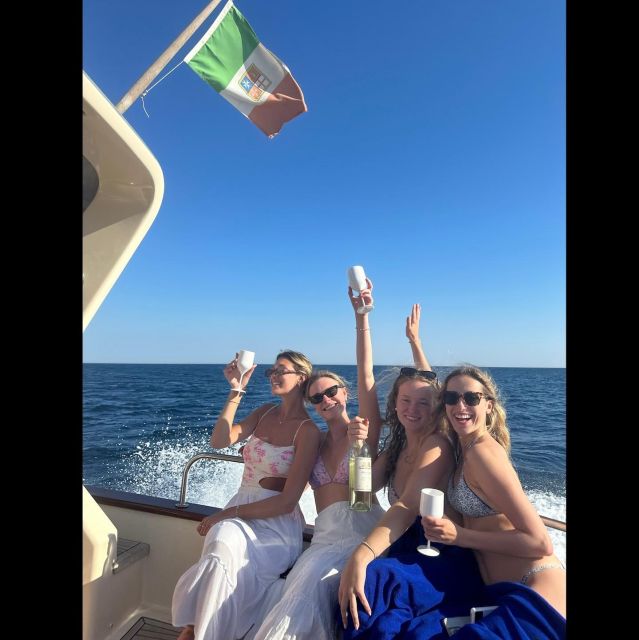 Sorrento: Luxury Private boat drinking & watching the sunset - A private Sorrento sunset boat, up close to the coast