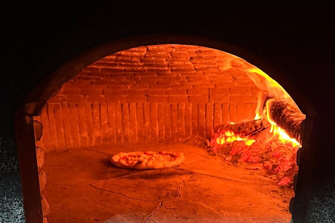 Sorrento Pizza Making Class with Local Pizzaiolo Hands on 100% - Wood-fired oven training: what to watch for while it cooks