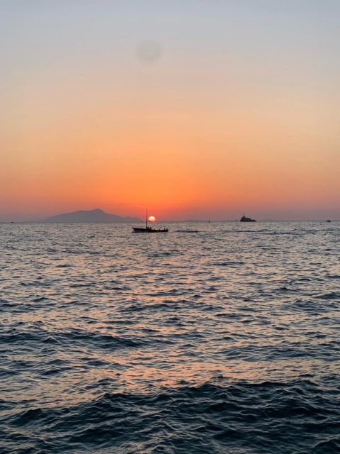 Sorrento: Sunset Coastal Boat Tour with Aperitif - Song of the Sea snorkeling moment, done as a break, not a mission