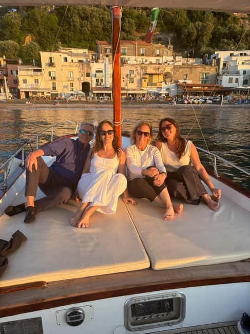Sorrento Sunset Cruise with Aperitif on Board - Punta Campanella, the marine-protected area, and Capri in the distance