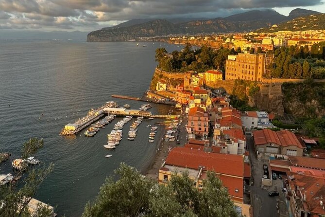 Sunset Amalfi Coast Vespa Tour With A Local - Positano: the vertical village, promenade views, and quick shopping time