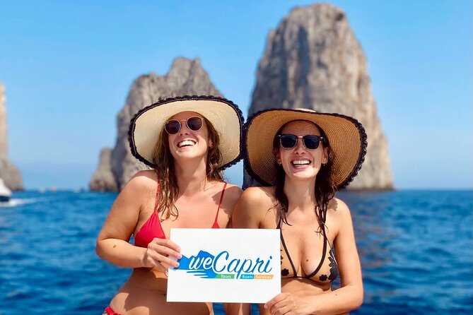 Sunset & Aperitif Boat tour - The route around Capri: Faraglioni, caves, Marina Piccola, and Punta Carena